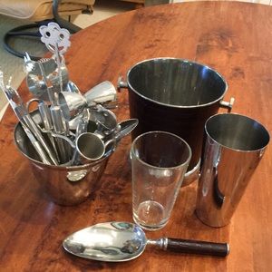 Ice bucket with scoop,  shaker, bar accessories.